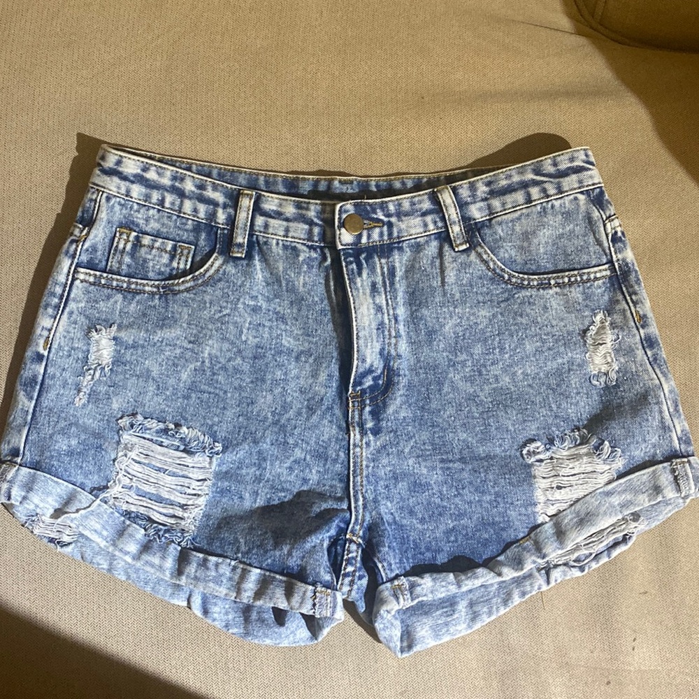 Distressed denim shorts